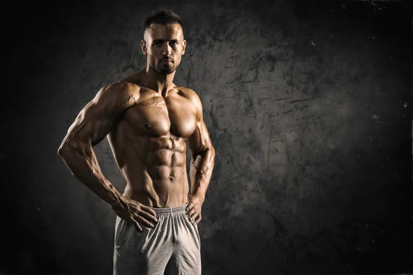 Strong Muscular Men Flexing Muscles — Stock Photo, Image