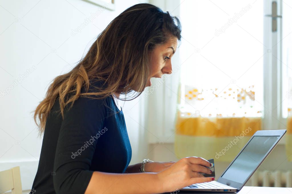 girl worried about an online financial transaction