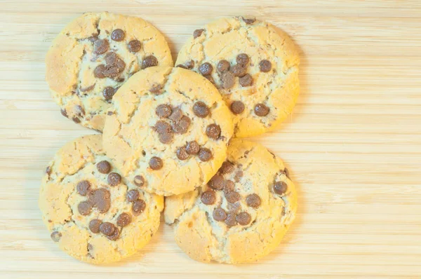 beautiful chocolate cookies in cutting board backgorund