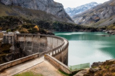 lake is formed with the Gloriettes dam on the Gave d'Estaube river in the Haute Pyrenees. clipart