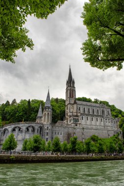 a view of the basilica of Lourdes, France clipart