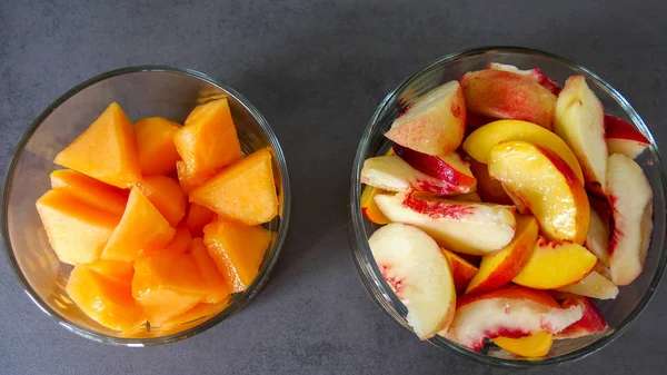 Two Glasses Bowls Cut Fruits Top View — Stock Photo, Image