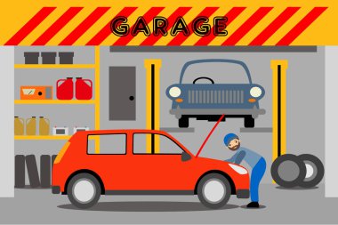 Garajda araba kırmızı genç tamirci onarır