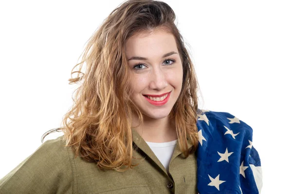 Młoda kobieta, w II wojnie światowej ujednolicona nas z amerykańską flagę — Zdjęcie stockowe