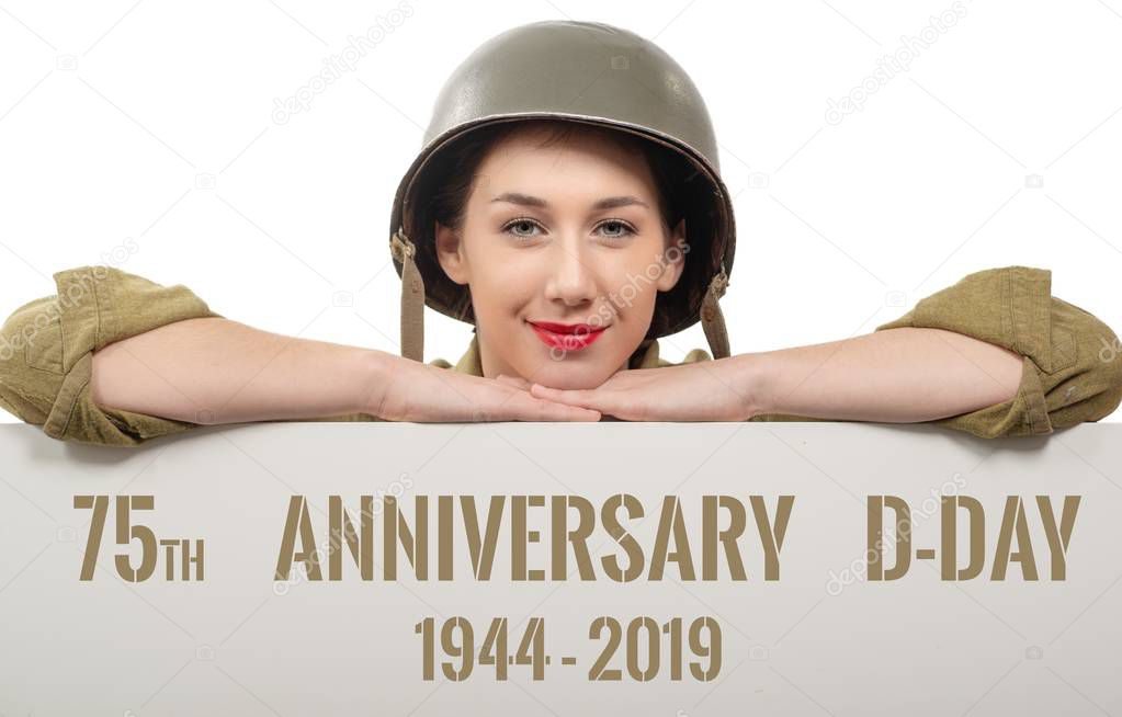 young woman dressed in us wwii military uniform with helmet show