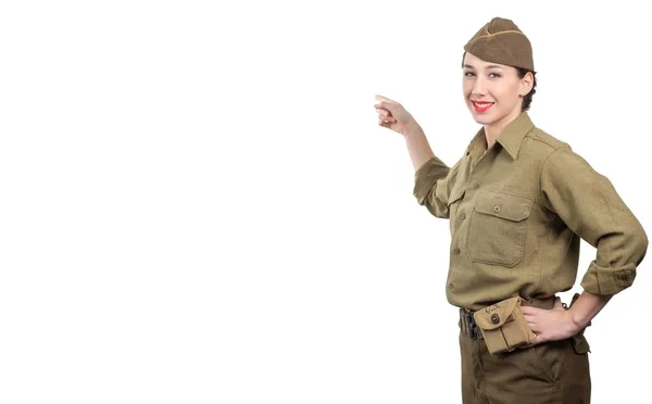 Mladá žena oblečená v americké WW2 vojenské uniformě ukazující jim — Stock fotografie