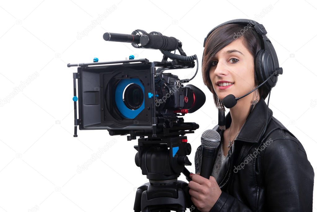 pretty young woman  journalist with microphone in television stu