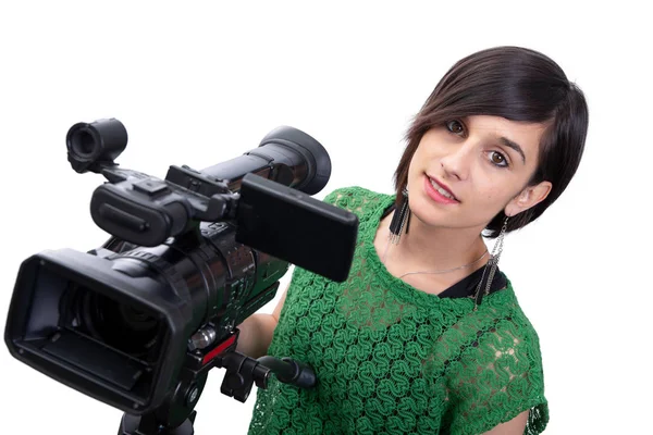 Young woman with professional video camera, on white — Stockfoto