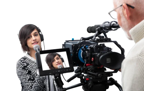 Pretty young woman  journalist presenting report in television s — Stock Photo, Image