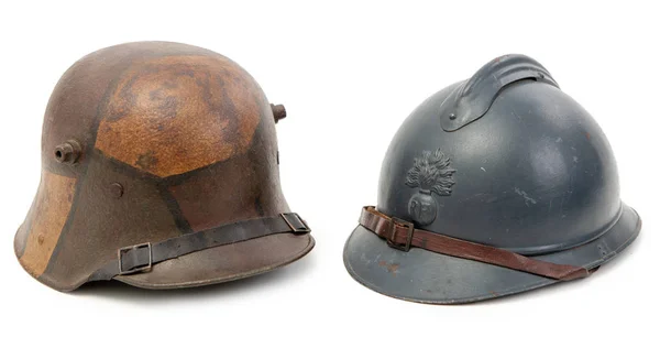 World war one french and german helmets on the white background — Stock Photo, Image