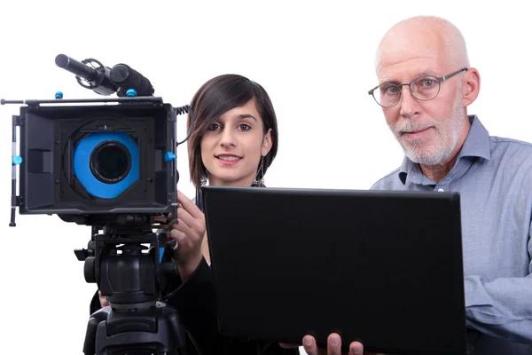 Cameraman and a young woman with a movie camera DSLR on white — Stock Photo, Image