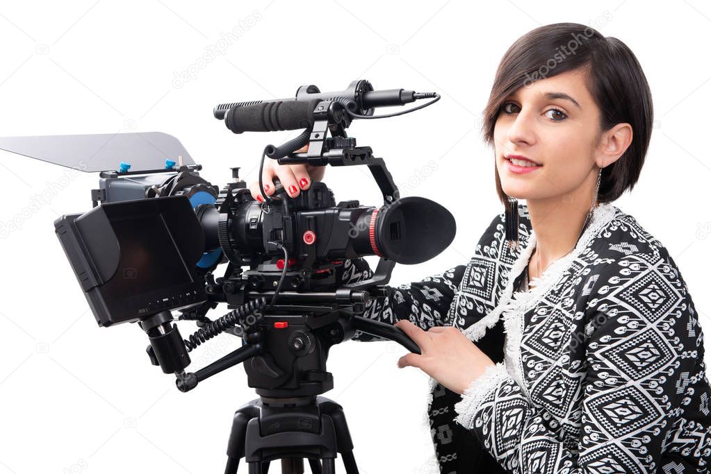 young woman with professional video camera, SLR, on white