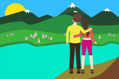 Taş kaya üzerinde genç çift ve güzel doğa landsca zevk