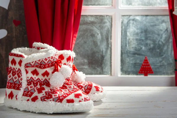 Merry Christmas concept greeting postcard with slipper shoes — Stock Photo, Image