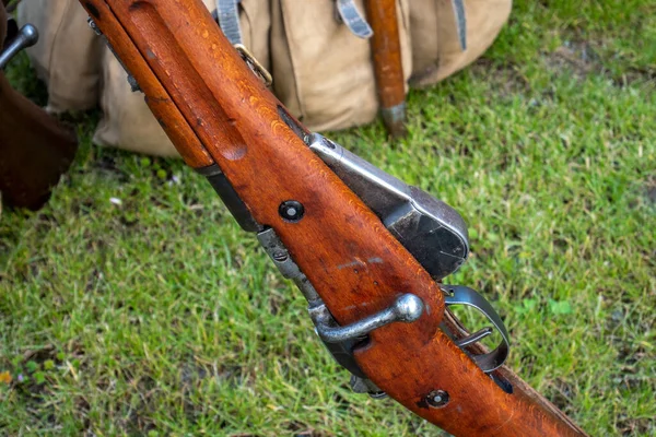 a detail of vintage rifle and magazine