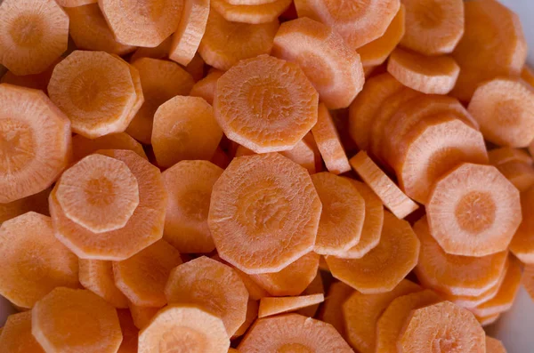 Background of carrot slices on the table