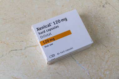 Açıklayıcı editoryal Xenical Orlistat ağırlık kaybı uyuşturucu, boşaltmak Bournemouth İngiltere 15 Haziran 2018 Kapsüller