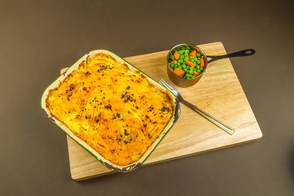 Shepherds or cottage pie in serving dish — Stock Photo, Image