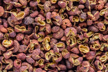 Üstten görünüm makro Sichuan biber. Çince pişirme kavramı. Çin mutfağı .