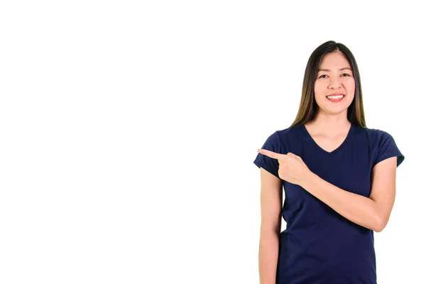 Asian Young Woman Blue Shirt Smiling Pointing Finger Space White — Stok fotoğraf