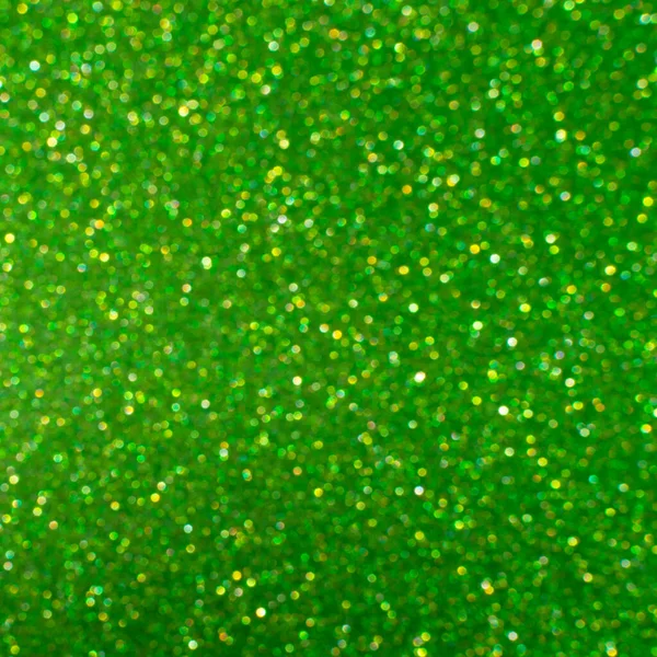 Glamor green sparkling background. Blured glitter background. Holiday abstract texture. Background of blue lights. — Stock Photo, Image