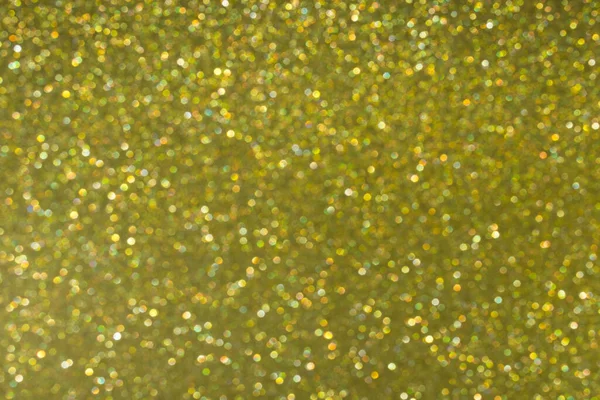 Fundo abstrato de ouro com bokeh, luzes de Natal desfocadas. Conceito festivo. Foco seletivo . — Fotografia de Stock