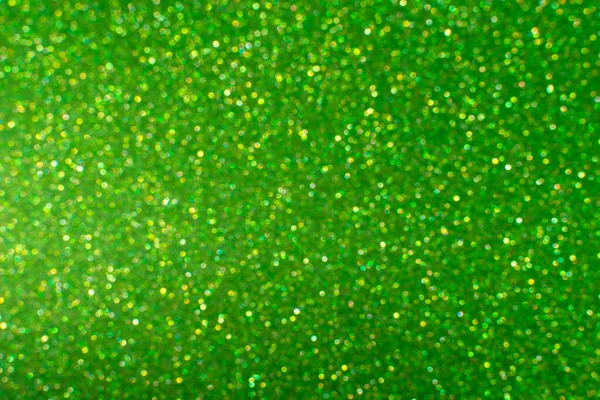 Glamor green sparkling background. Blured glitter background. Holiday abstract texture. Background of blue lights. — Stock Photo, Image