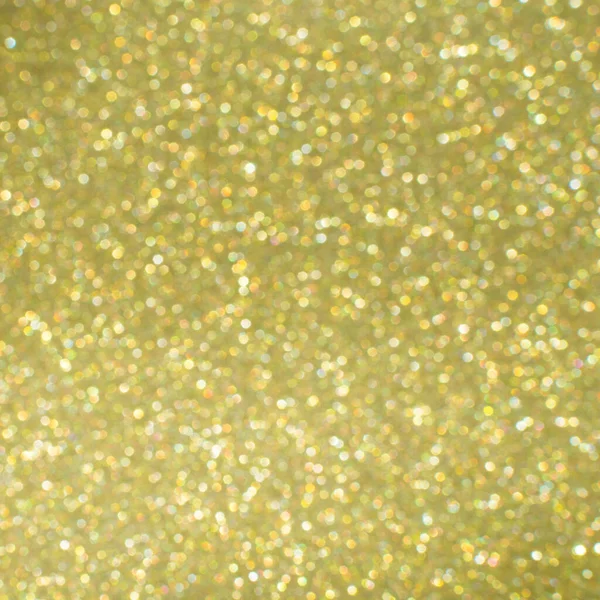 Fundo abstrato de ouro com bokeh, luzes de Natal desfocadas. Conceito festivo. Foco seletivo . — Fotografia de Stock
