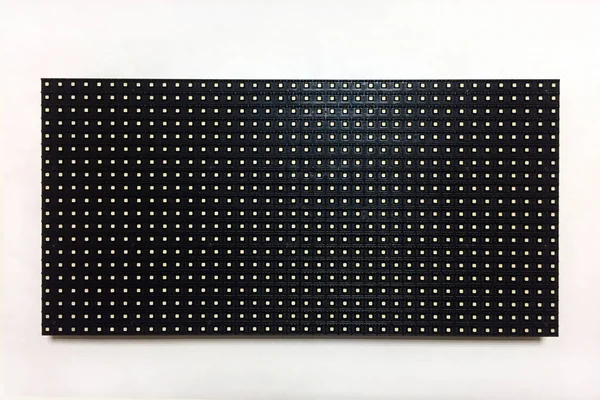 LED module for the manufacture of LED screens and scoreboards on a white background. Components for illuminated advertising. Close-up.