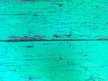 Eski çizik tahtalar yeşile boyanmış. Arka plan ve doku.