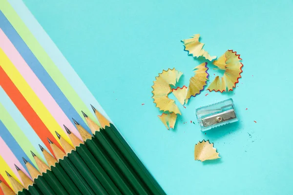 colored pencils, trash and rainbow colorful stripes, stationary