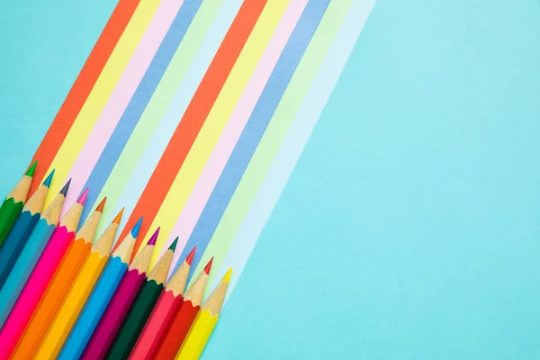 colored pencils and rainbow colorful stripes, stationary