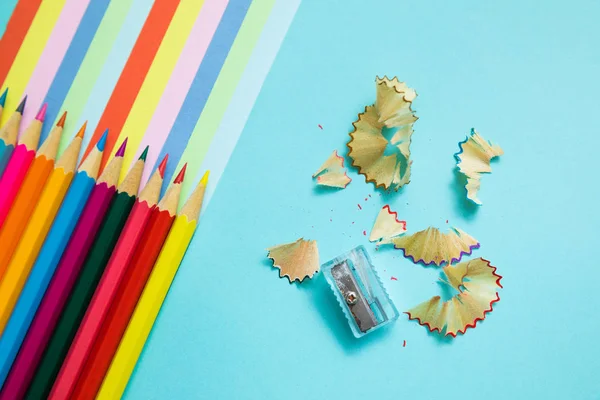 colored pencils, trash and rainbow colorful stripes, stationary