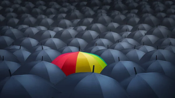 businessman with colorful rainbow umbrella among others, unique different concept