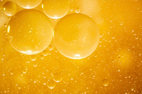 Golden Yellow Bubble Oil Droplet Abstract Background Stock Picture