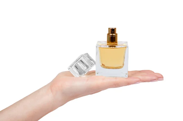 Frasco Perfume Dourado Com Mão Isolada Sobre Fundo Branco — Fotografia de Stock