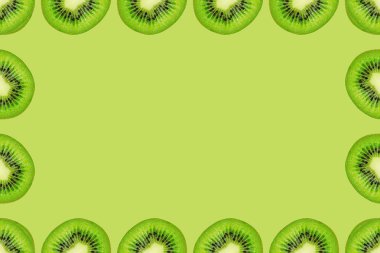 Dilim yeşil ham Kivi Meyve arka plan, çerçeve ve sınır, boş alanı.