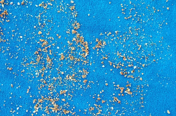 Texture Tissu Bleu Serviette Douce Avec Sable Macro Photo — Photo