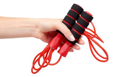 Kırmızı fitness ve spor yaşam için el ile ip atlama. Beyaz arka plan üzerinde izole