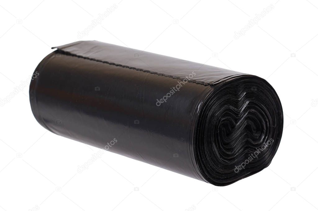 roll of black plastic garbage bags for trash. Isolated on white background