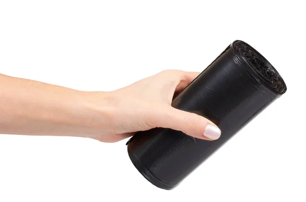 Hand Met Roll Van Zwart Plastic Vuilniszakken Voor Trash Geïsoleerd — Stockfoto