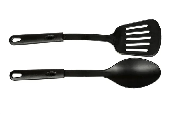 Hand Black Plastic Kitchen Spoon Spatula Kitchenware Cooking Isolated White Royalty Free Stock Images