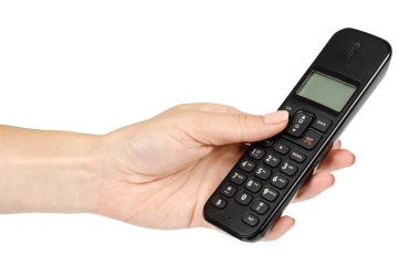El, eski teknoloji kavramı ile modern sabit telsiz telefon. Beyaz arka plan üzerinde izole