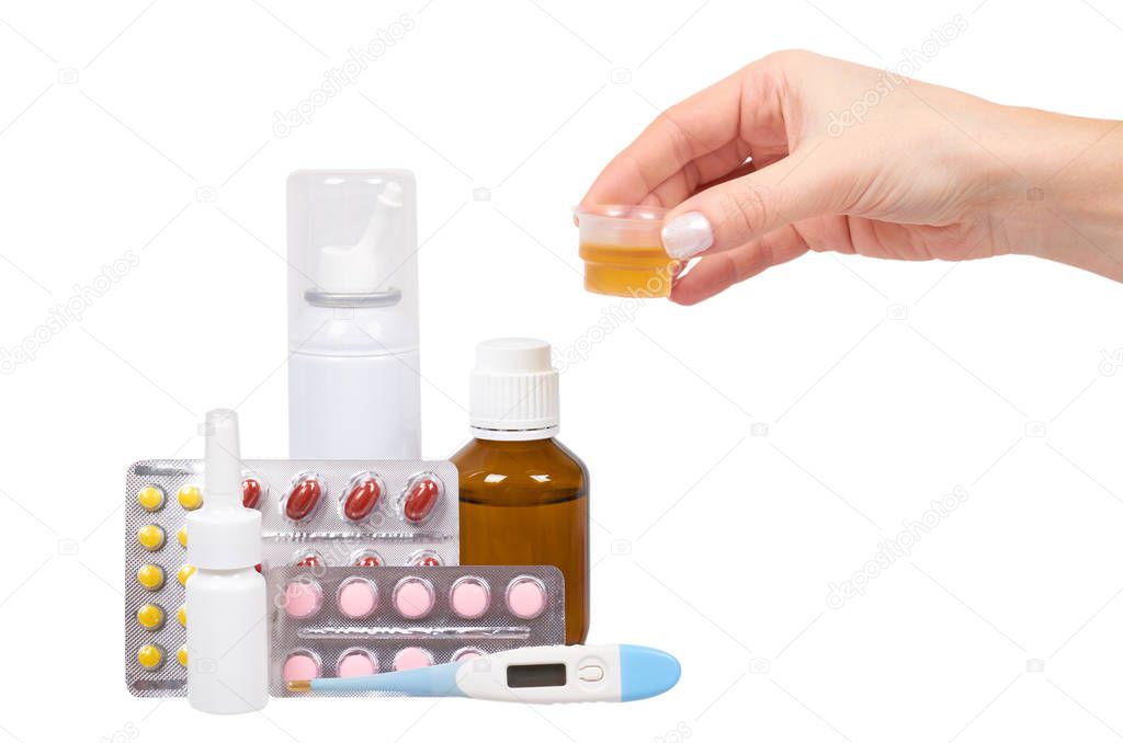 Bottle with medicine, nasal spray with hand. Antipyretic syrup and pills. Medication for cold treatment. Isolated on white background