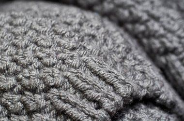 Makro fotoğraf kumaş desen, tekstil giyim alan sığ derinliği ile kapatın. Yumuşak malzeme arka plan bulanık