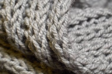 Makro fotoğraf kumaş desen, tekstil giyim alan sığ derinliği ile kapatın. Yumuşak malzeme arka plan bulanık