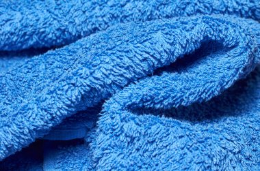 Makro fotoğraf kumaş desen, tekstil giyim alan sığ derinliği ile kapatın. Yumuşak malzeme arka plan bulanık