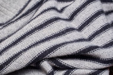 Makro fotoğraf kumaş desen, tekstil giyim alan sığ derinliği ile kapatın. Yumuşak malzeme arka plan bulanık