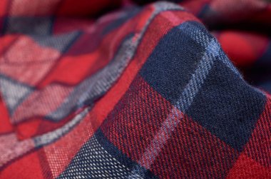 Makro fotoğraf kumaş desen, tekstil giyim alan sığ derinliği ile kapatın. Yumuşak malzeme arka plan bulanık