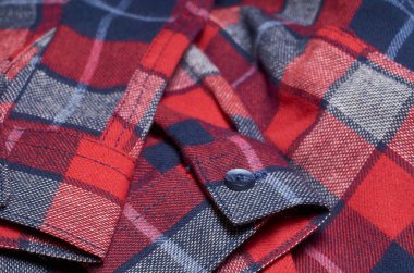 Makro fotoğraf kumaş desen, tekstil giyim alan sığ derinliği ile kapatın. Yumuşak malzeme arka plan bulanık